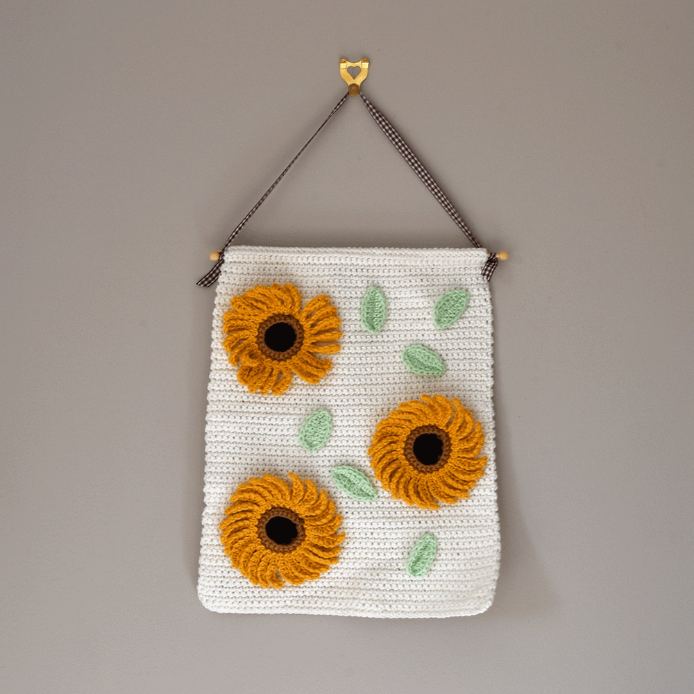 Image of Sunflower Wallhanging Crochet Pattern by Zoe Potrac in Sirdar Happy Cotton DK